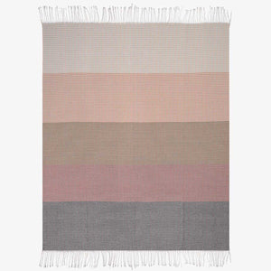 Top viewof lyric collection read and black wrap, blanket or throw sustainably and ethically made in South Africa shows the intricate weave and colors folded up on white background