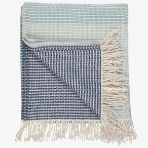 lyric collection blue and white wrap, blanket or throw sustainably and ethically made in South Africa folded on a white background