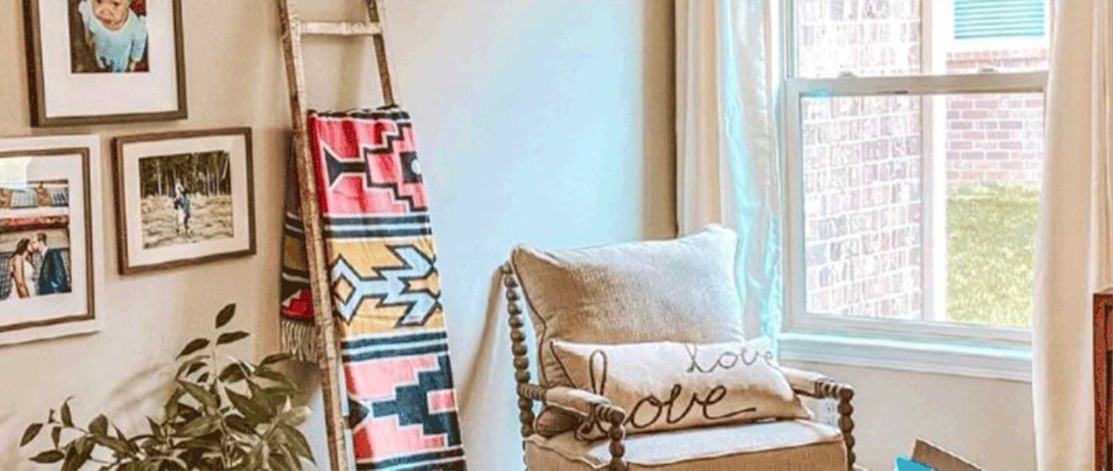 Blanket ladder in home with Ndebele blanket on it