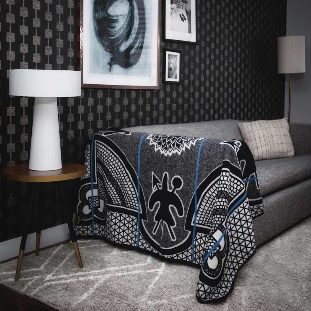 Basotho Heritage blanket Kharetsa blanket, wrap or throw sustainably and ethically made in South Africa in South Africa chromatic royal blue and cobalt throw draped across a  bed in modern home 