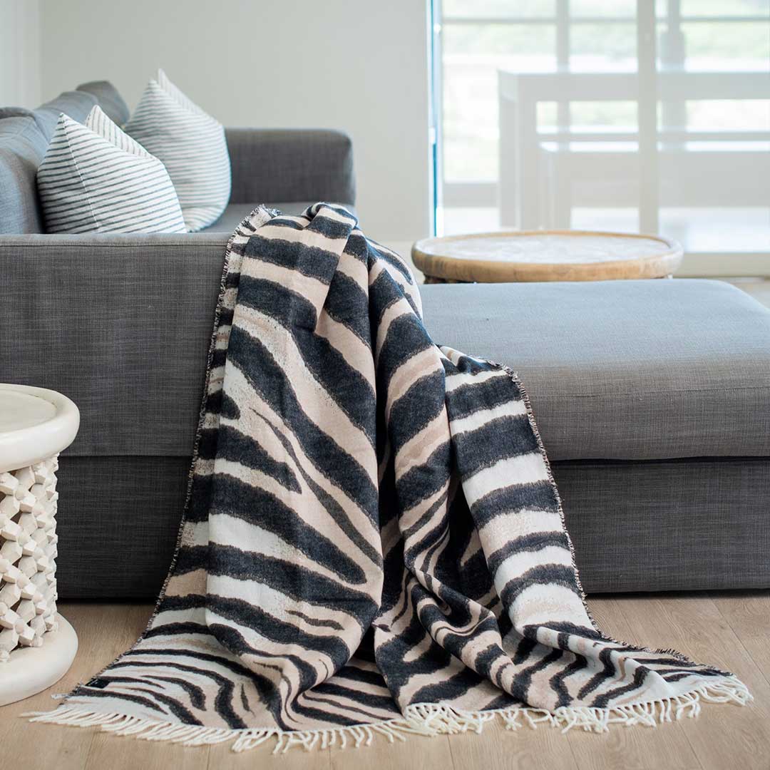 African Zebra Throw and Bed Blanket Lying on sofa