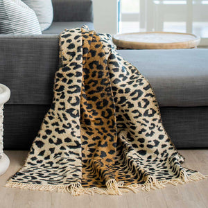 African Leopard Print Yoga Throw and Blanket laying on the sofa